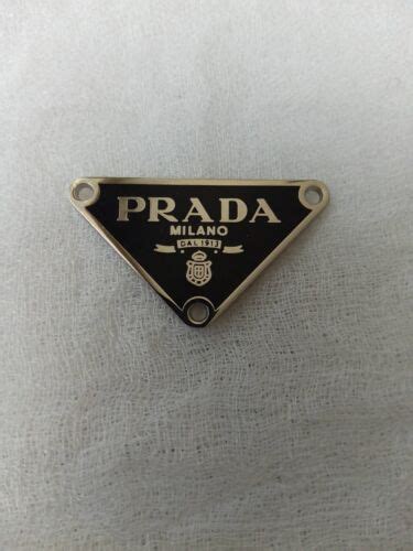 prada womans shoe gold emblem replacement|prada gold low top shoes.